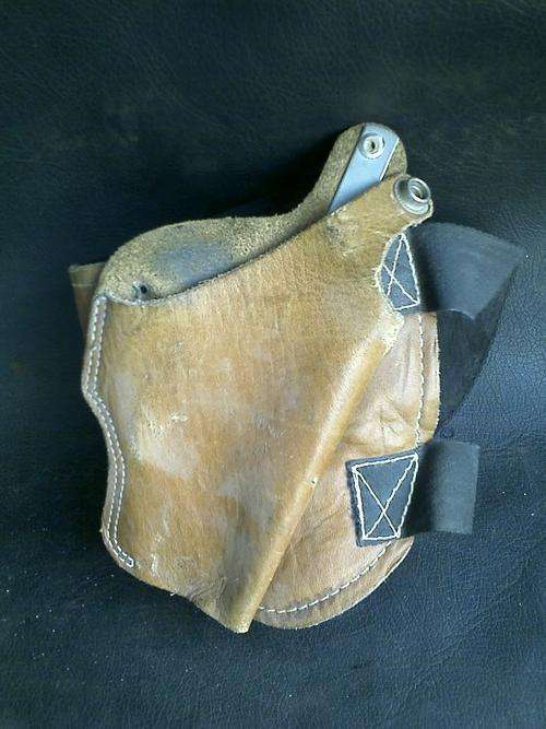 WALTER PP LEATHER GUN HOLSTER FOR YOUR ANKLE. VELCRO STRAPS. SOME WEAR AND TEAR.