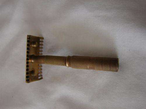 Vintage razor / brass
