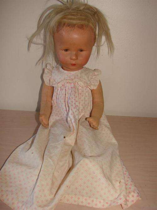 VINTAGE DOLL / WITH CELULLOID OR HARD PLASTIC HEAD AND MATERIAL BODY