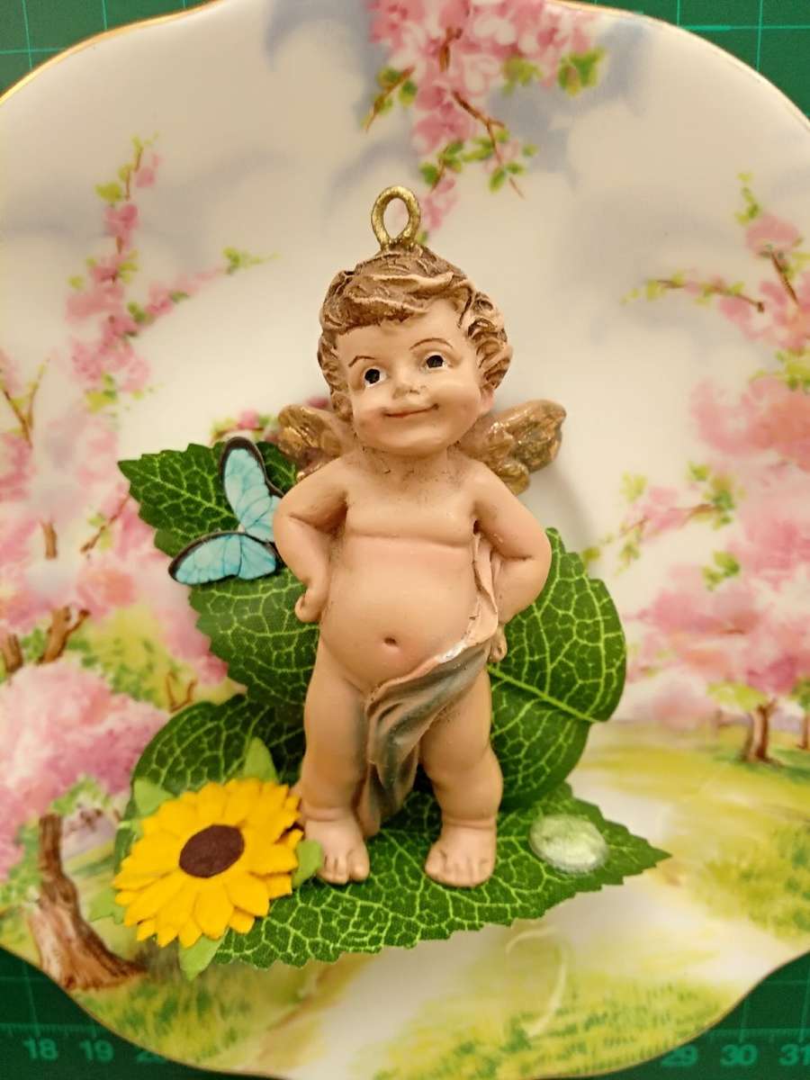 Angel in the flowers' garden /Angel statue/Decoration/Beautiful decoration/Statue/Angel