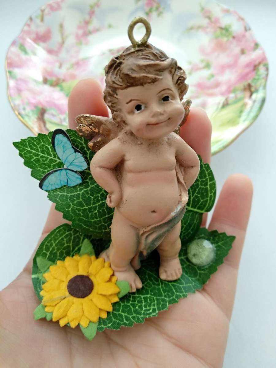 Angel in the flowers' garden /Angel statue/Decoration/Beautiful decoration/Statue/Angel