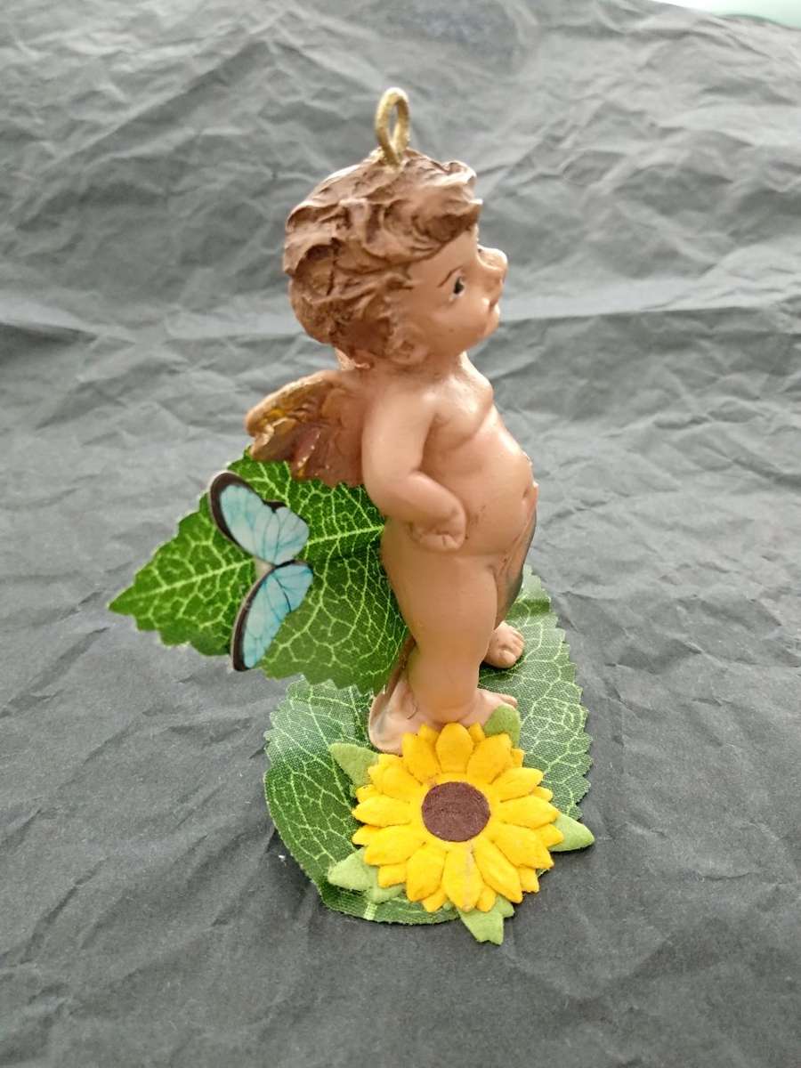Angel in the flowers' garden /Angel statue/Decoration/Beautiful decoration/Statue/Angel