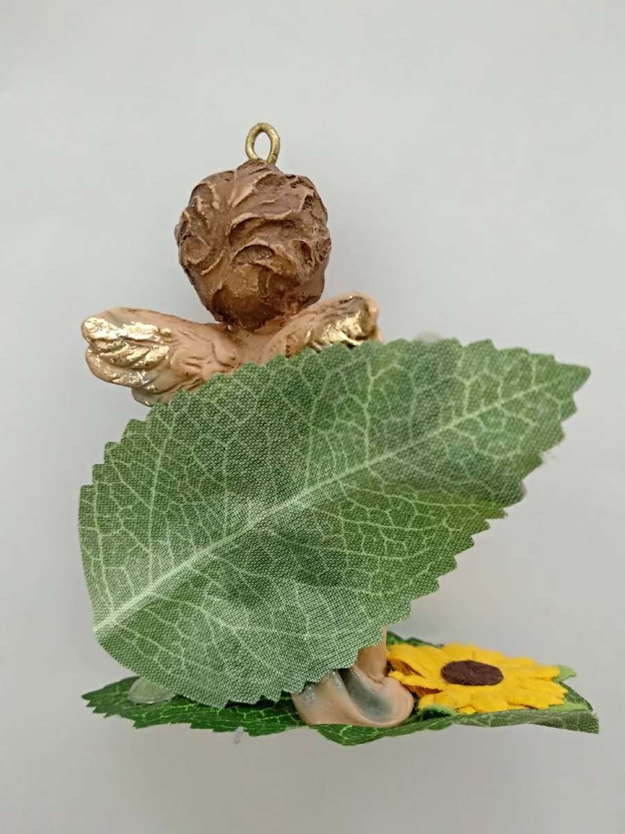 Angel in the flowers' garden /Angel statue/Decoration/Beautiful decoration/Statue/Angel