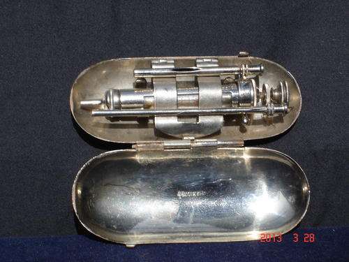A vintage cased Burrougs Wellcome&CO syringe.