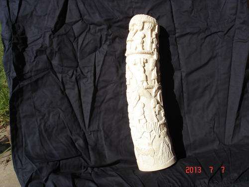 Carved ivory tusk.
