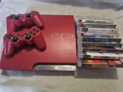 Secondhand Red PlayStation 3 300GB with games & controllers