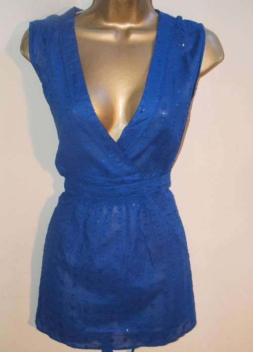 Size 14 (large) New ladies blue top with sparkle thread by Cato clothing.