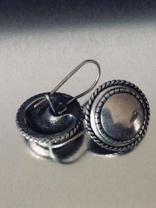 LOVELY ROUND BURNISHED SILVER EARRINGS FROM MIGLIO.