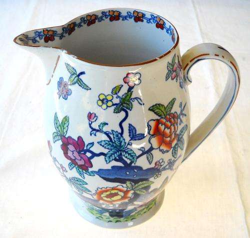 BEAUTIFUL PORCELAIN JUG. BOOTH FLOWER DESIGN DATED 1910 SIZE; 20CM