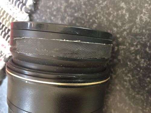 Nikon 24-70mm f2.8 with both lens caps and hood.