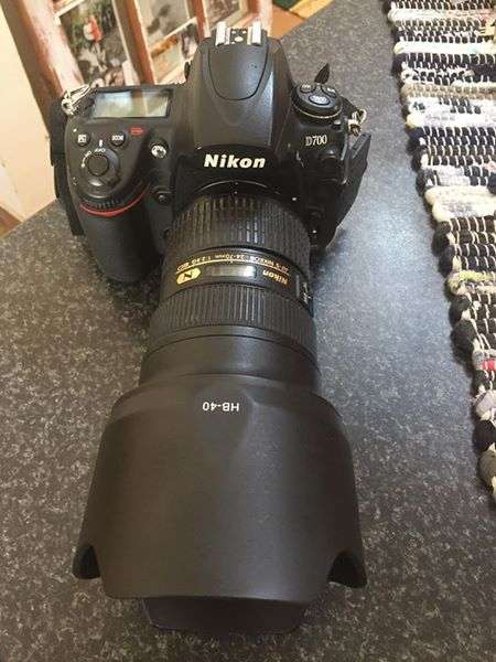 Nikon 24-70mm f2.8 with both lens caps and hood.