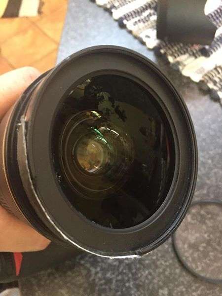 Nikon 24-70mm f2.8 with both lens caps and hood.