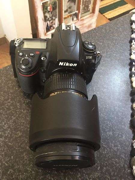 Nikon 24-70mm f2.8 with both lens caps and hood.