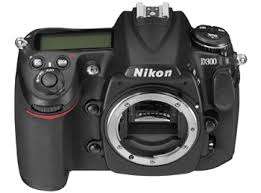 Nikon D300 with less than 30000 actuations. Includes battery grip, 2 batteries and charger..