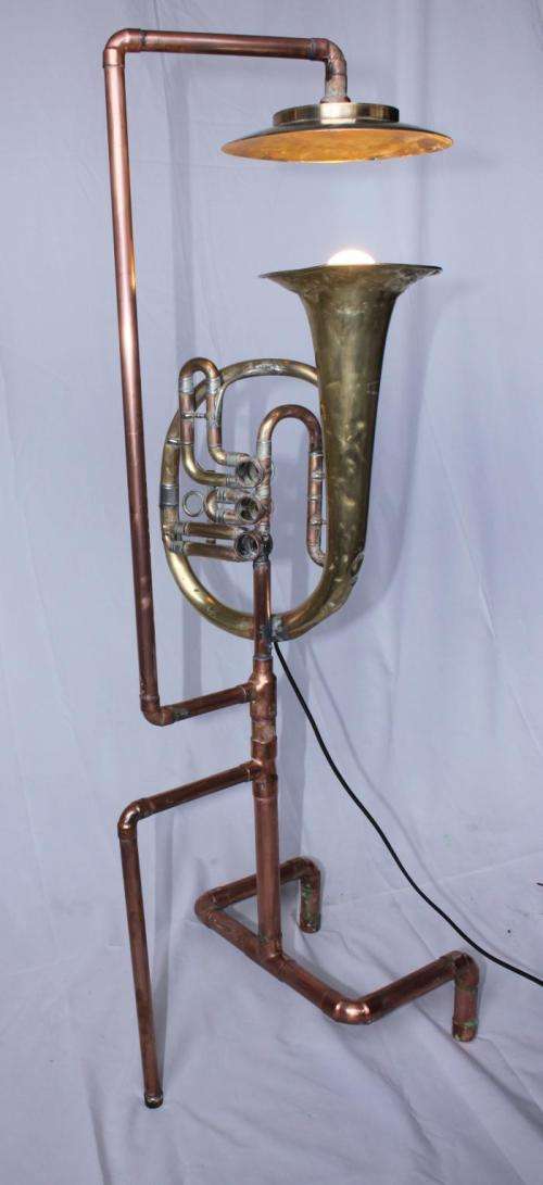 Steam punk light with brass musical instrument