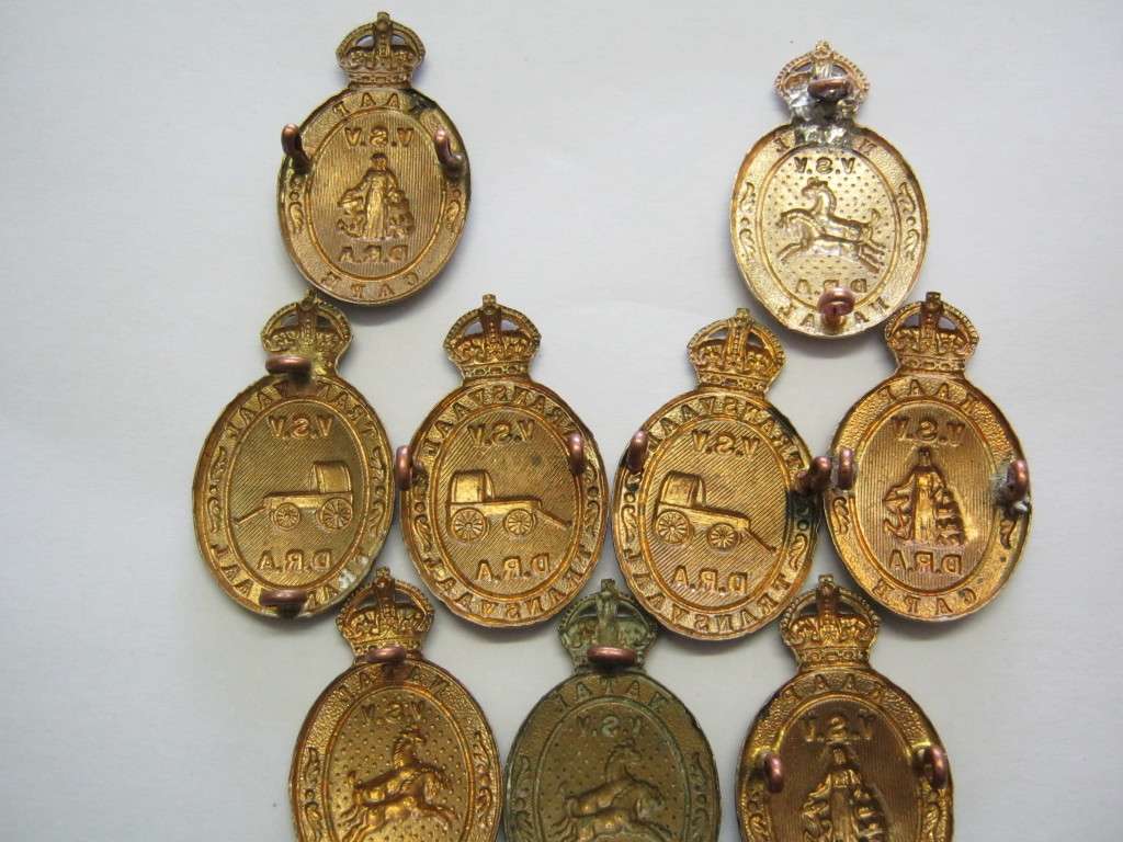 Lot of 9 SA District Rifle Ass. badges