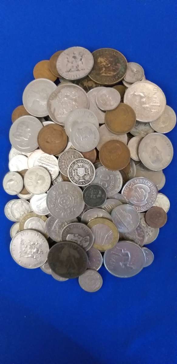 Mixed world coins. One bid takes all.