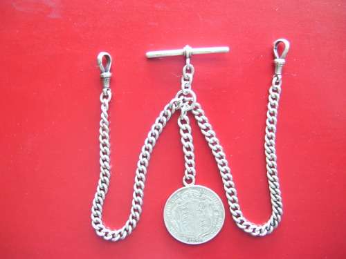 Beautiful sterling silver (925) Alphret fob chian with a 1917 king George half crown pendant.