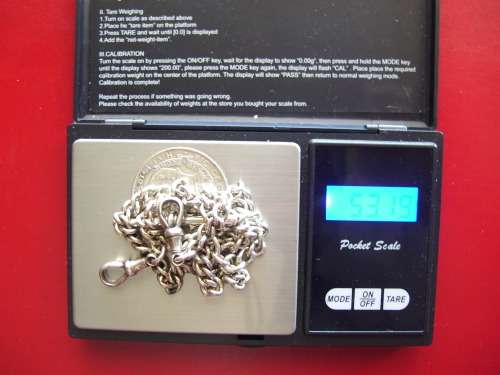 Beautiful sterling silver (925) Alphret fob chian with a 1917 king George half crown pendant.