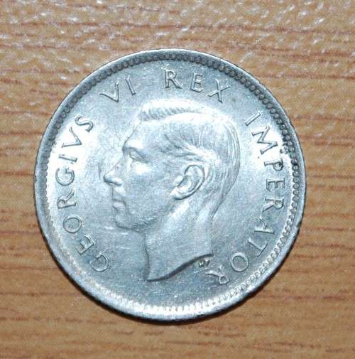 " Six Pence 1942 "