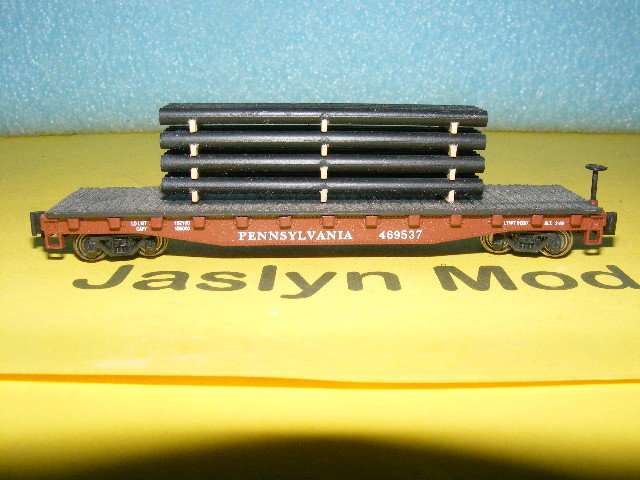 Bachmann N-Gauge Flatbed with Pipe load.
