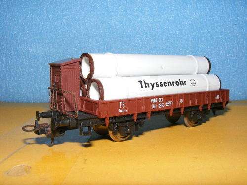 Lima HO Flat Bed with pipe load.