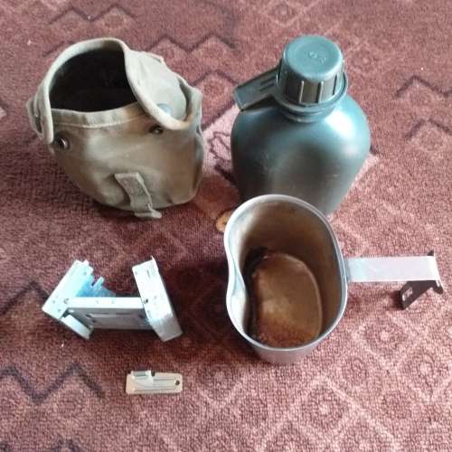Esbit stove, opener, firebucket, waterbottle and pouch.