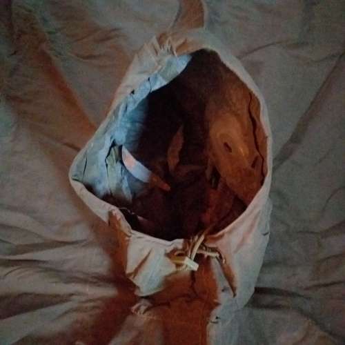 Poncho/Ground sheet with carrier and kidney pouches.