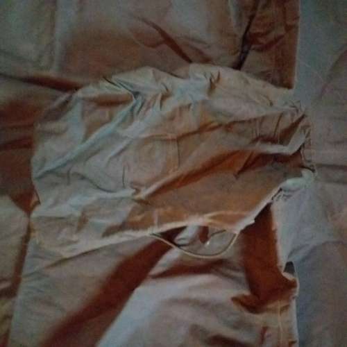 Poncho/Ground sheet with carrier and kidney pouches.