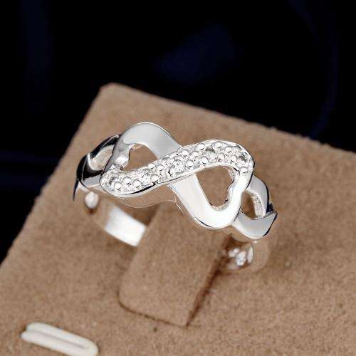 New 925 Sterling Silver filled Infinity style ring adorned with genuine AAA crystals