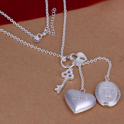 New 925 Sterling silver Double Locket necklace with free heart and key charms. 1st on R1 auctions