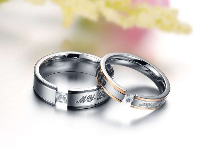 1st on BoB, Stainless steel Lovers couple rings,Bid on the Mens ring, recieve the Womans FREE.