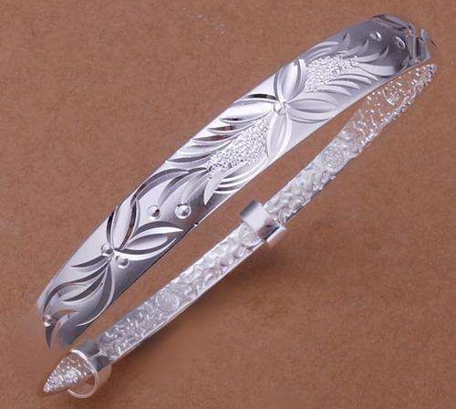 Local stock, New 925 Sterling silver filled ladies bangle with fine detail flower work