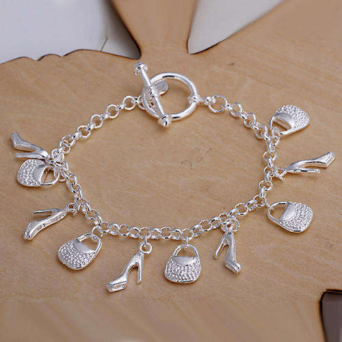 New 925 Sterling silver filled Charm bracelet with shoe and handbag charms included