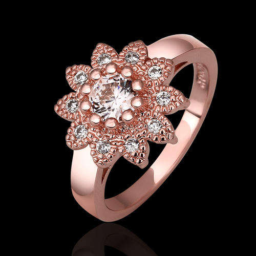 New 18K RGP in rose gold ladies flower design ring adorned in AAA genuine Austrian crystals