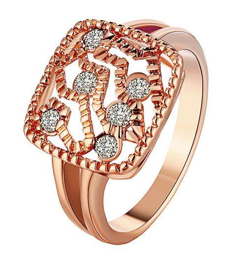 New 18K RGP in rose gold ladies ring with filigree design and genuine Crystal detail