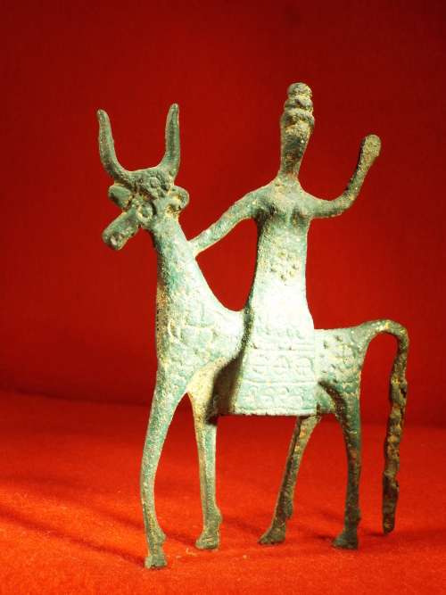 Ancient Geometric Era Greek Replica Bronze figurine of a `Woman on a Bull`. Ref. MA-25