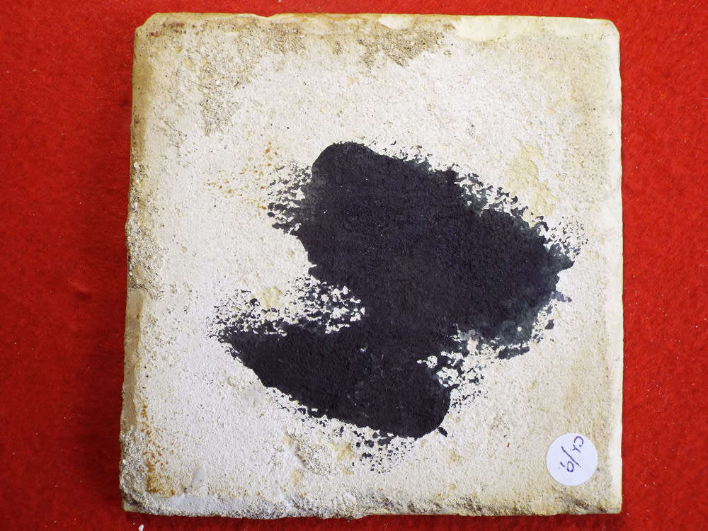 A rare `Bristol` manganese coloured `Delft` wall tile Ref.#CL-9