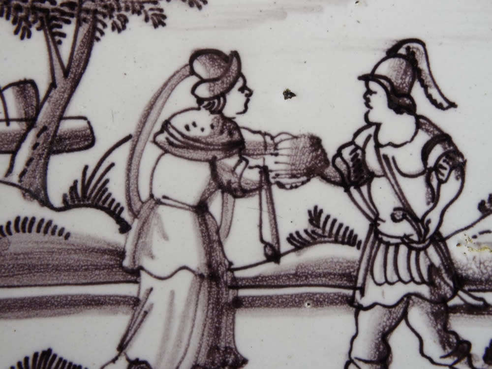 A rare `Bristol` manganese coloured `Delft` wall tile Ref.#CL-9