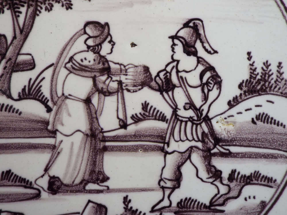 A rare `Bristol` manganese coloured `Delft` wall tile Ref.#CL-9