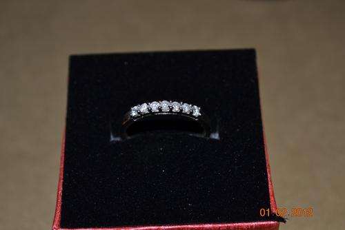 CERTIFIED RING WITH 7 GENUINE WHITE DIAMONDS IN 14KT WHITE GOLD
