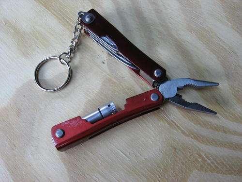 Small multi tool  ( Red )
