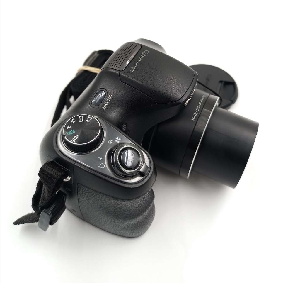 Sony Cyber-Shot DSC-H100 16.1MP Digital Camera (Black) with 21x Optical Zoom