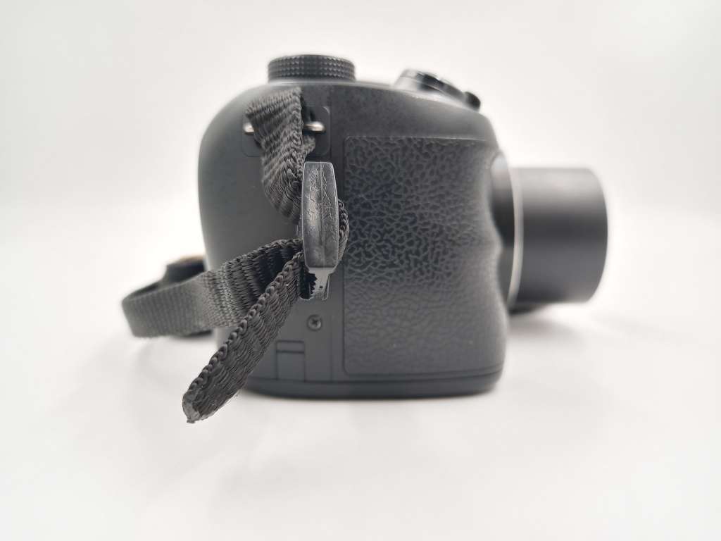 Sony Cyber-Shot DSC-H100 16.1MP Digital Camera (Black) with 21x Optical Zoom