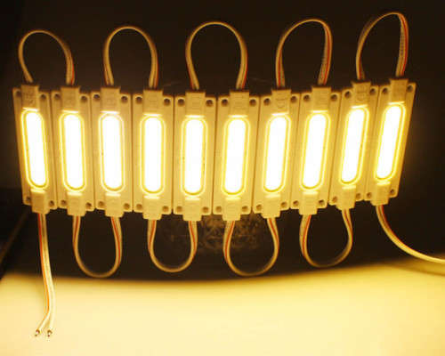 LED Light Modules: Waterproof COB Injection Moulded in Orange Colour. Collections are allowed.