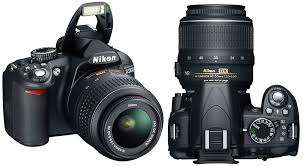 Nikon D3100 14.2MP Digital SLR with 18-55mm + (lowepro adventura 170 bag )