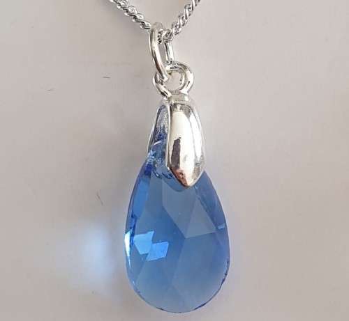 Blue pendant on silver chain