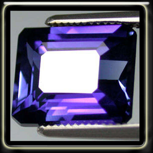 ATTRACTIVE 3.72CT VIOLET BLUE SAPPHIRE POLISHED IN A EMERALD CUT. RARE GEMSTONE!!!
