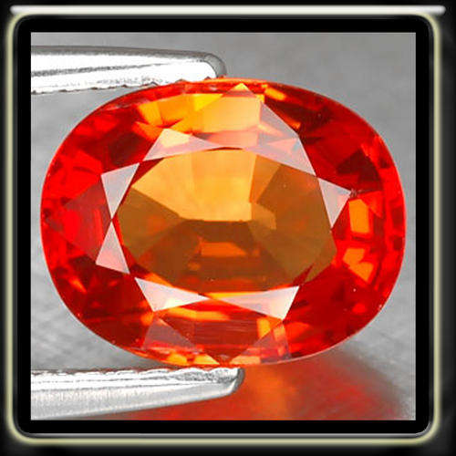 ATTRACTIVE 3.45CT VIVID SONGEA ORANGE SAPPHIRE CUT IN A MODERN OVAL GEMSTONE