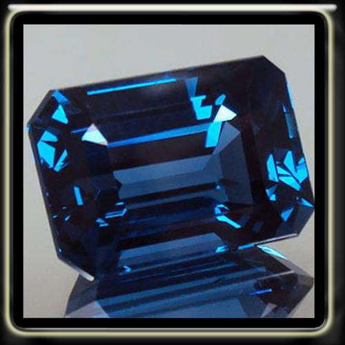 EXQUISITE 1.55CT DEEP LONDON BLUE EMERALD CUT TOPAZ WITH BEAUTIFULL LUSTRE
